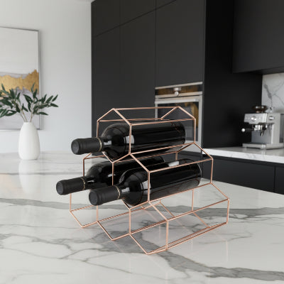 Range bouteille métal or rose élégant avec finition luxueuse